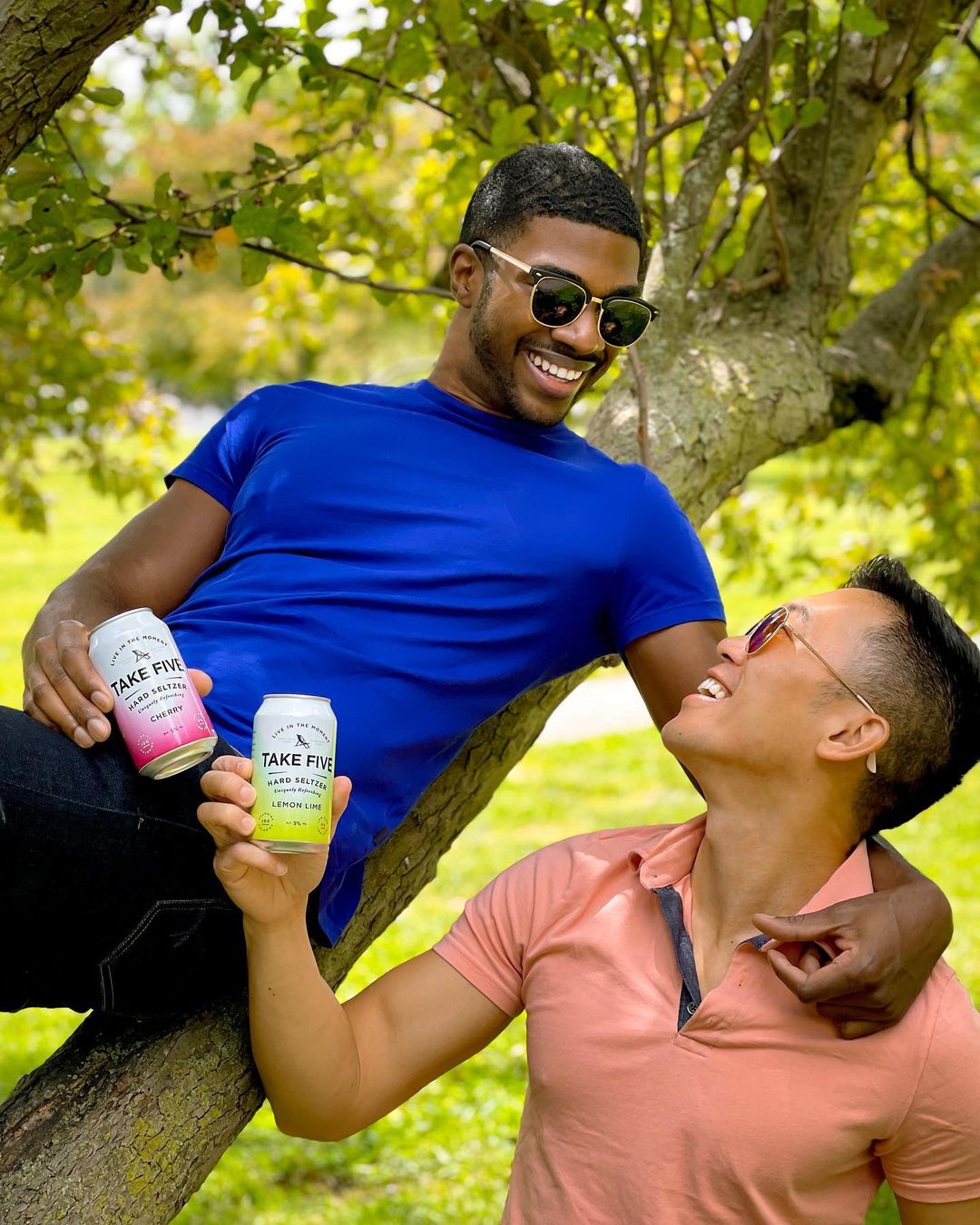 two men holding seltzer